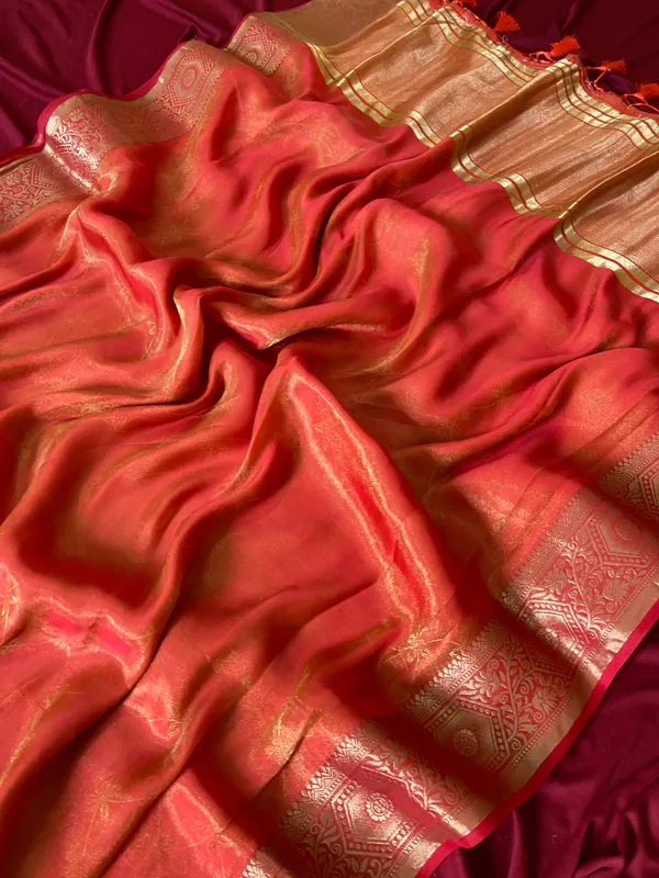 Premium_Soft_Fandy_Satin_sarees_with_Beautiful_Self_Design_Weaving__Pallu_With_Attractive_Traditional_Zari_Weaving__Border_With_All_Over_Self_Weaving__Design_And_Self_Design_Weaving__Blouse_With_Fancy_Tassels