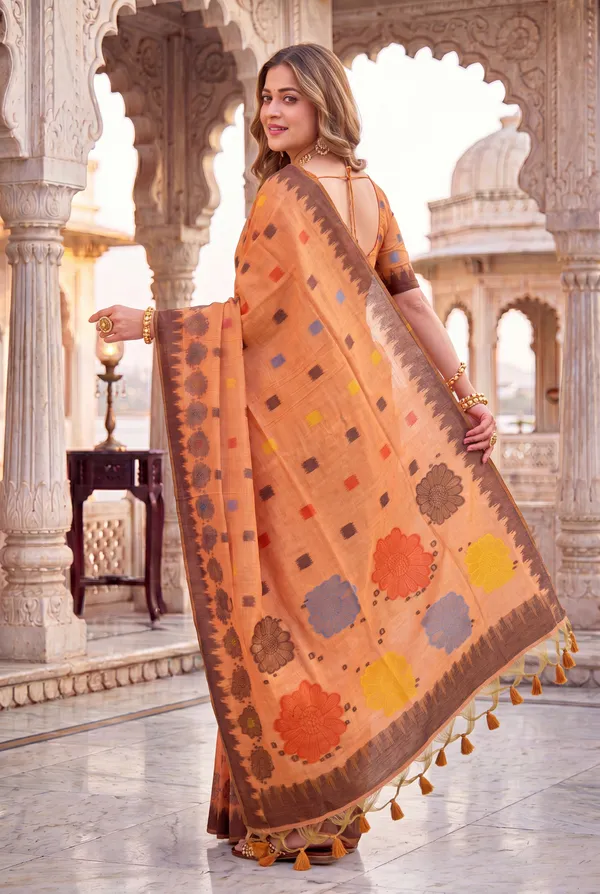 Premium_Soft_Muga_Cotton_sarees_with_Beautiful_Colourfull_3D_Woven_Flower_Design_Pallu_With_Attractive_All_Over_Resham_Weaving_Butti_Design_With_Resham_Weaving_Border_And_Resham_Weaving_Butti_Blouse_With_Fancy_Tassels