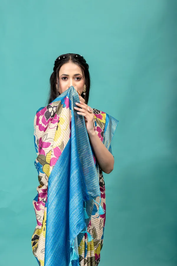 Soft_Tussar_Silk_sarees_with_Beautiful_Style_Of_Floral_Digital_Print_With_Attractive_Border_And_Contrast_Print_Blouse_With_Tassels