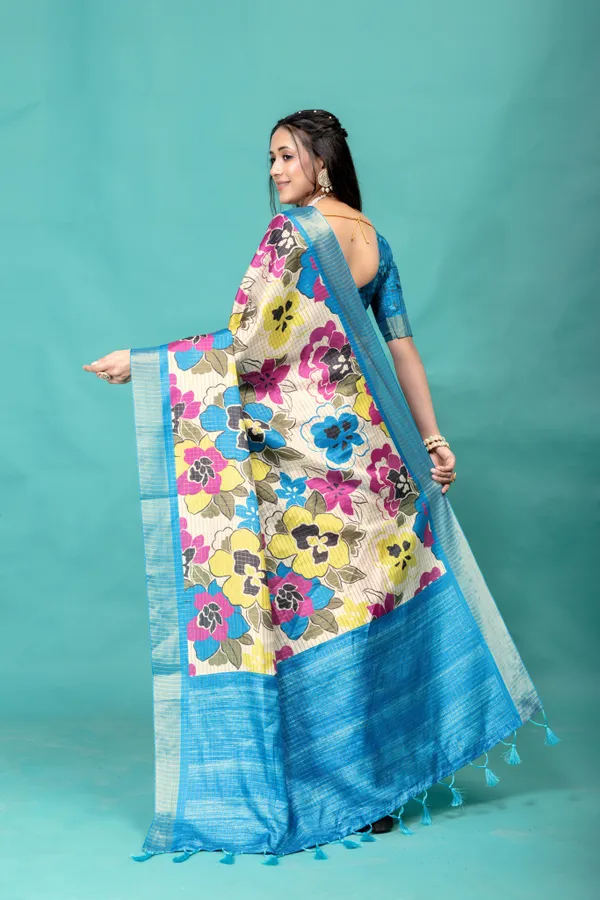 Soft_Tussar_Silk_sarees_with_Beautiful_Style_Of_Floral_Digital_Print_With_Attractive_Border_And_Contrast_Print_Blouse_With_Tassels