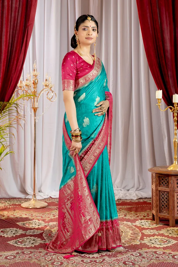 Banarasi_Pure_Satin_Silk_sarees_with_Beautiful_Elephant_in_Contrast_Pink-Rama_Shades_With_Attractive_Weaving_Gold_Zari_Design_And_Contrast_Blouse_With_Tassels