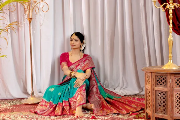 Banarasi_Pure_Satin_Silk_sarees_with_Beautiful_Elephant_in_Contrast_Pink-Rama_Shades_With_Attractive_Weaving_Gold_Zari_Design_And_Contrast_Blouse_With_Tassels