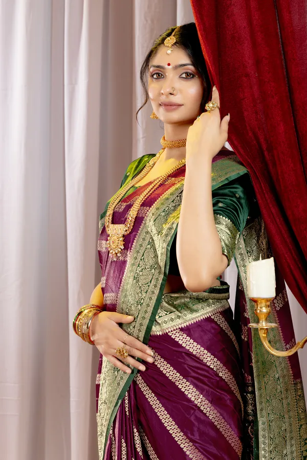 Banarasi_Pure_Satin_Silk_sarees_with_Beautiful_Elephant_in_Contrast_Green-Wine_Shades_With_Attractive_Weaving_Gold_Zari_Design_And_Contrast_Blouse_With_Tassels