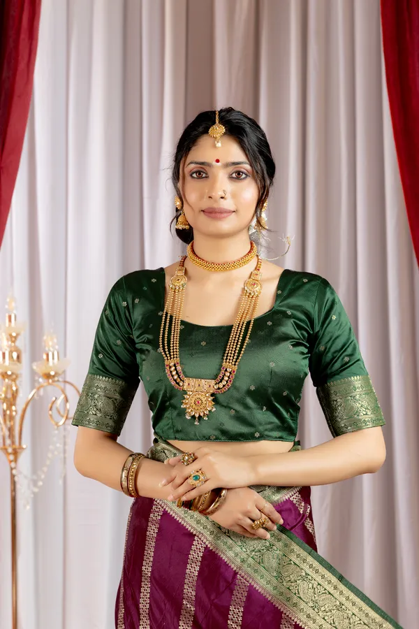 Banarasi_Pure_Satin_Silk_sarees_with_Beautiful_Elephant_in_Contrast_Green-Wine_Shades_With_Attractive_Weaving_Gold_Zari_Design_And_Contrast_Blouse_With_Tassels