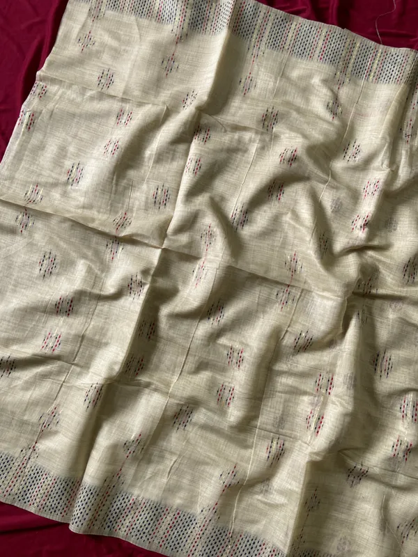 Premium_Soft_Muga_Cotton_sarees_with_Beautiful_Colourfull_3D_Woven_Small_Motifs_Pallu_With_Attractive_All_Over_Resham_Weaving_Butti_Design_With_Resham_Weaving_Border_And_Resham_Weaving_Butti_Blouse_With_Fancy_Tassels