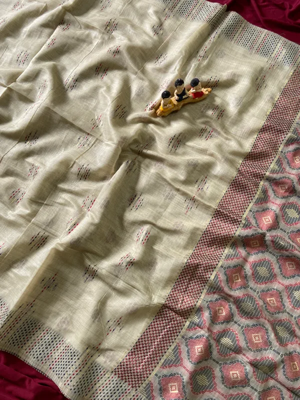 Premium_Soft_Muga_Cotton_sarees_with_Beautiful_Colourfull_3D_Woven_Small_Motifs_Pallu_With_Attractive_All_Over_Resham_Weaving_Butti_Design_With_Resham_Weaving_Border_And_Resham_Weaving_Butti_Blouse_With_Fancy_Tassels