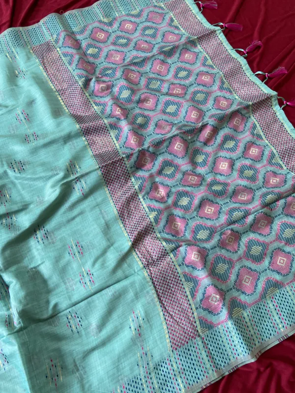 Premium_Soft_Muga_Cotton_sarees_with_Beautiful_Colourfull_3D_Woven_Small_Motifs_Pallu_With_Attractive_All_Over_Resham_Weaving_Butti_Design_With_Resham_Weaving_Border_And_Resham_Weaving_Butti_Blouse_With_Fancy_Tassels