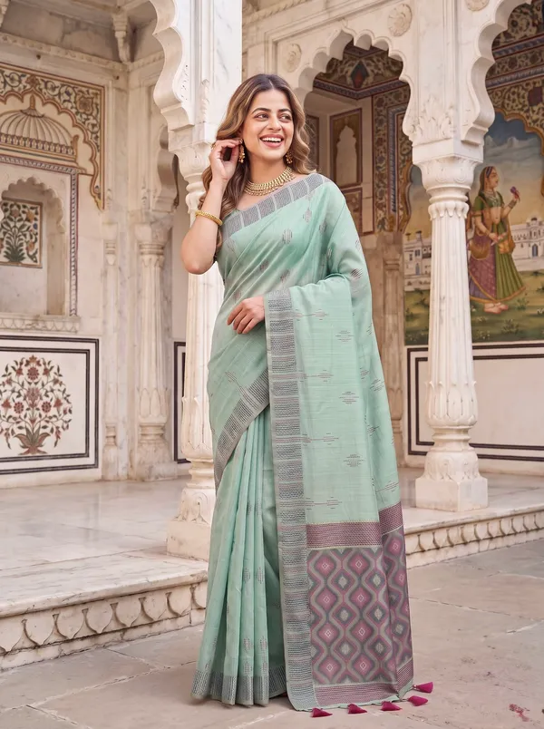Premium_Soft_Muga_Cotton_sarees_with_Beautiful_Colourfull_3D_Woven_Small_Motifs_Pallu_With_Attractive_All_Over_Resham_Weaving_Butti_Design_With_Resham_Weaving_Border_And_Resham_Weaving_Butti_Blouse_With_Fancy_Tassels
