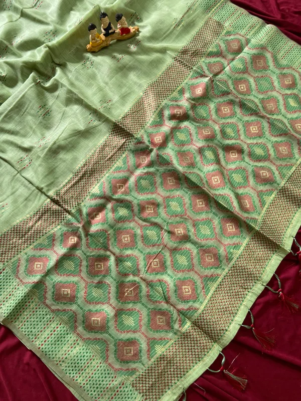 Premium_Soft_Muga_Cotton_sarees_with_Beautiful_Colourfull_3D_Woven_Small_Motifs_Pallu_With_Attractive_All_Over_Resham_Weaving_Butti_Design_With_Resham_Weaving_Border_And_Resham_Weaving_Butti_Blouse_With_Fancy_Tassels