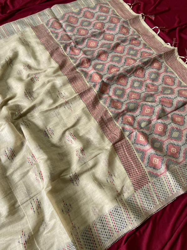 Premium_Soft_Muga_Cotton_sarees_with_Beautiful_Colourfull_3D_Woven_Small_Motifs_Pallu_With_Attractive_All_Over_Resham_Weaving_Butti_Design_With_Resham_Weaving_Border_And_Resham_Weaving_Butti_Blouse_With_Fancy_Tassels