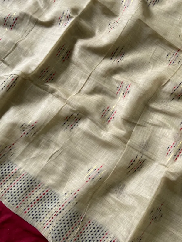 Premium_Soft_Muga_Cotton_sarees_with_Beautiful_Colourfull_3D_Woven_Small_Motifs_Pallu_With_Attractive_All_Over_Resham_Weaving_Butti_Design_With_Resham_Weaving_Border_And_Resham_Weaving_Butti_Blouse_With_Fancy_Tassels