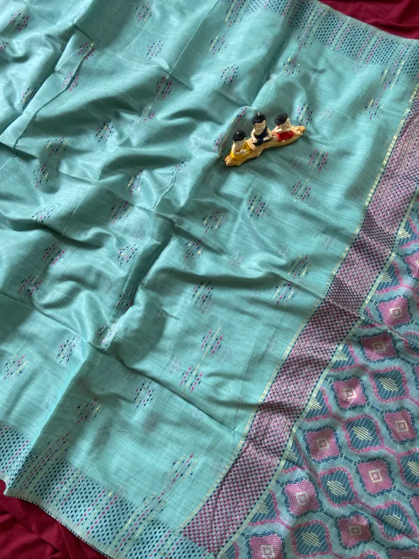 Premium_Soft_Muga_Cotton_sarees_with_Beautiful_Colourfull_3D_Woven_Small_Motifs_Pallu_With_Attractive_All_Over_Resham_Weaving_Butti_Design_With_Resham_Weaving_Border_And_Resham_Weaving_Butti_Blouse_With_Fancy_Tassels