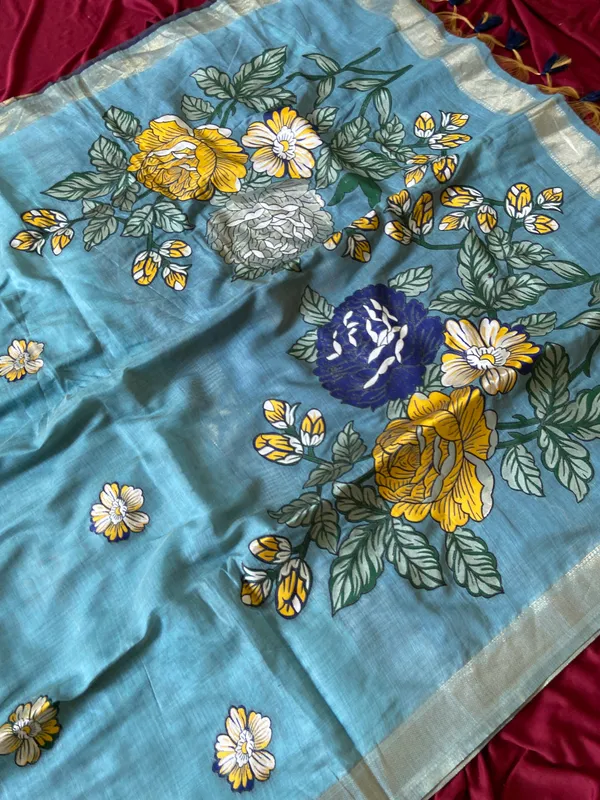 Premium_Soft_Muga_Cotton_sarees_with_Beautiful_Colourfull_Resham_Weaving_Flower_Design_Pallu_With_Attractive_All_Over_Resham_Weaving__Flower_Design_With_Zari_Weaving_Border_And_Contrast_Blouse_With_Fancy_Tassels