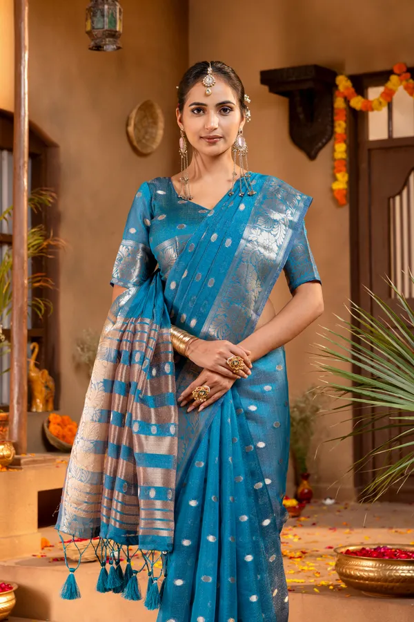 Premium_Soft_Khadi_Shimmer_sarees_with_Beautiful_Butti_Design_Weaving__Pallu_With_Attractive_Traditional_Zari_Weaving__Border_With_All_Over_Butti_Weaving__Design_And_Butti_Design_Weaving__Blouse_With_Fancy_Tassels