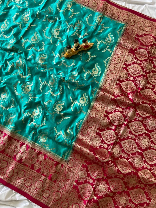 Banarasi_Pure_Satin_Silk_sarees_with_Beautiful_Peacock_in_Contrast_Pink-Rama_Shades_With_Attractive_Weaving_Gold_Zari_Design_And_Contrast_Blouse_With_Tassels