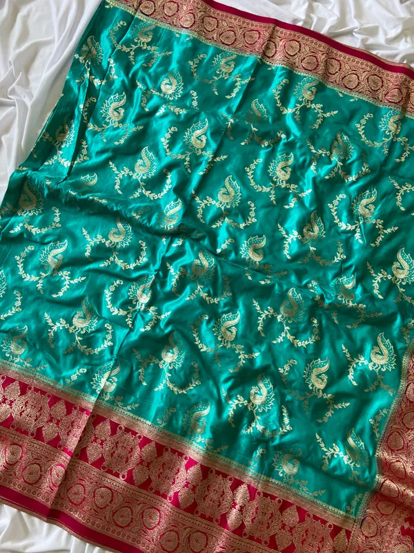 Banarasi_Pure_Satin_Silk_sarees_with_Beautiful_Peacock_in_Contrast_Pink-Rama_Shades_With_Attractive_Weaving_Gold_Zari_Design_And_Contrast_Blouse_With_Tassels