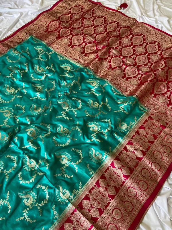 Banarasi_Pure_Satin_Silk_sarees_with_Beautiful_Peacock_in_Contrast_Pink-Rama_Shades_With_Attractive_Weaving_Gold_Zari_Design_And_Contrast_Blouse_With_Tassels