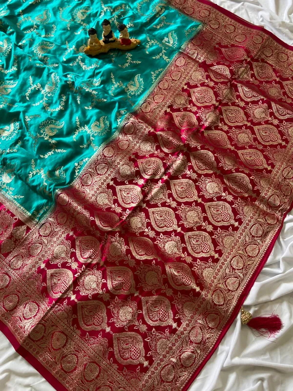 Banarasi_Pure_Satin_Silk_sarees_with_Beautiful_Peacock_in_Contrast_Pink-Rama_Shades_With_Attractive_Weaving_Gold_Zari_Design_And_Contrast_Blouse_With_Tassels