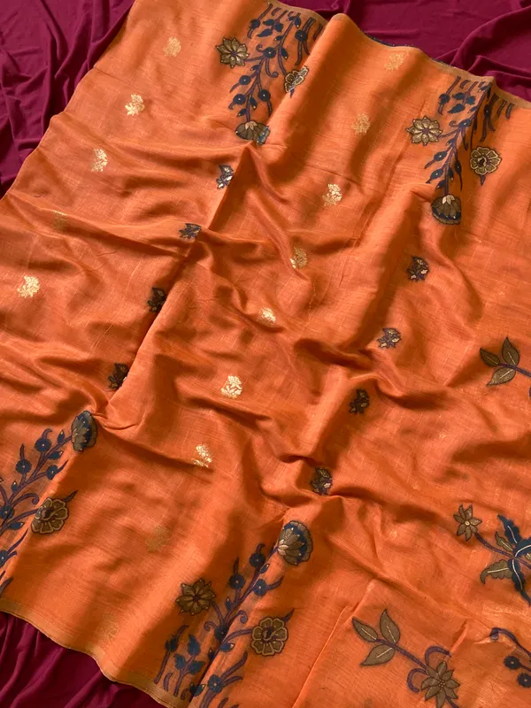 Premium_Soft_Muga_Cotton_sarees_with_Beautiful_Colourfull_Resham_Weaving__Flower_Design_Pallu_With_Attractive_Traditional_Zari_Weaving__With_All_Over__Resham_Weaving__And_Resham_Weaving_Butti_Blouse_With_Fancy_Tassels