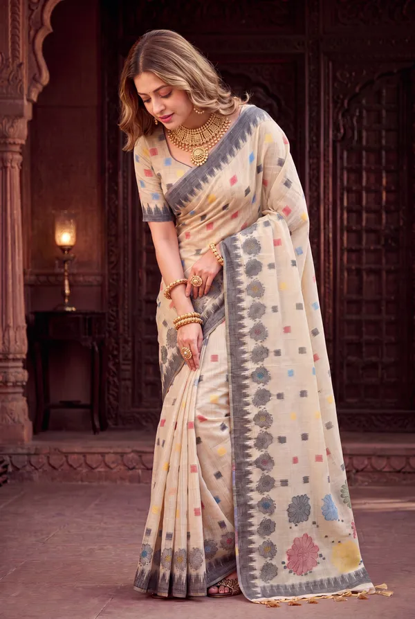 Premium_Soft_Muga_Cotton_sarees_with_Beautiful_Colourfull_3D_Woven_Flower_Design_Pallu_With_Attractive_All_Over_Resham_Weaving_Butti_Design_With_Resham_Weaving_Border_And_Resham_Weaving_Butti_Blouse_With_Fancy_Tassels