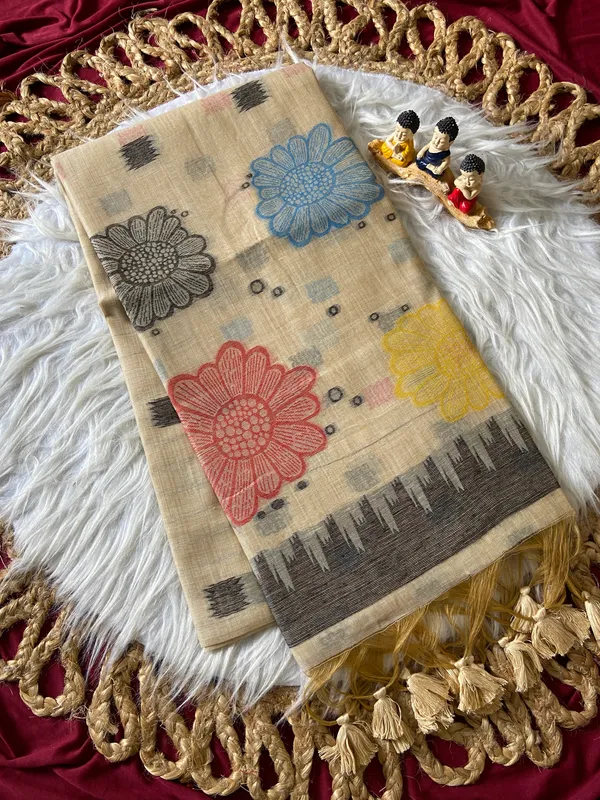 Premium_Soft_Muga_Cotton_sarees_with_Beautiful_Colourfull_3D_Woven_Flower_Design_Pallu_With_Attractive_All_Over_Resham_Weaving_Butti_Design_With_Resham_Weaving_Border_And_Resham_Weaving_Butti_Blouse_With_Fancy_Tassels