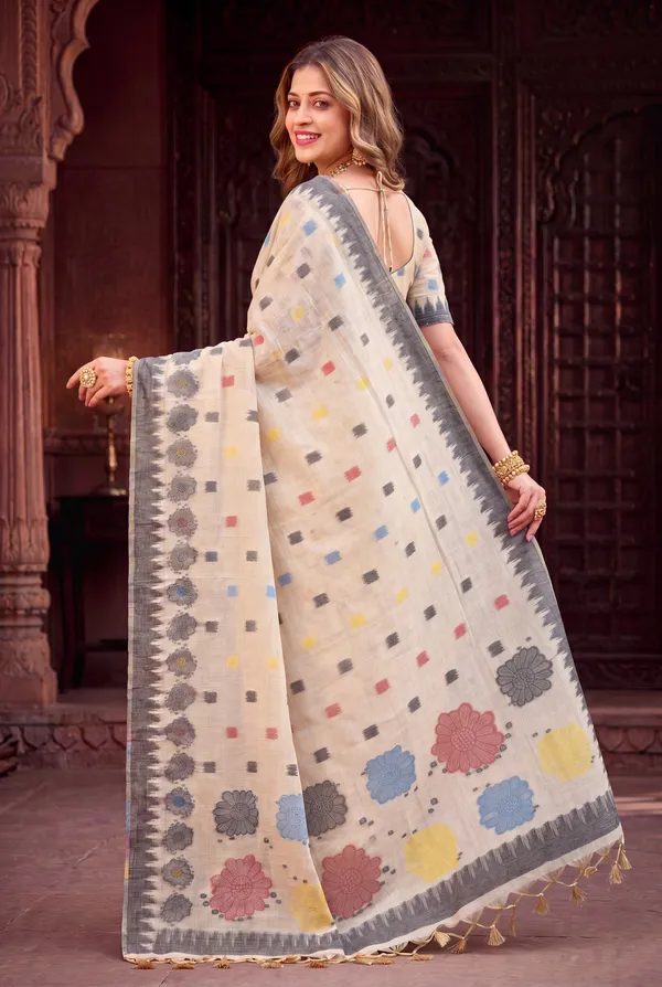 Premium_Soft_Muga_Cotton_sarees_with_Beautiful_Colourfull_3D_Woven_Flower_Design_Pallu_With_Attractive_All_Over_Resham_Weaving_Butti_Design_With_Resham_Weaving_Border_And_Resham_Weaving_Butti_Blouse_With_Fancy_Tassels
