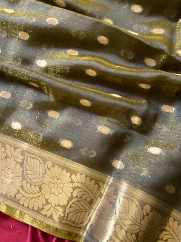 Premium_Soft_Khadi_Shimmer_sarees_with_Beautiful_Butti_Design_Weaving__Pallu_With_Attractive_Traditional_Zari_Weaving__Border_With_All_Over_Butti_Weaving__Design_And_Butti_Design_Weaving__Blouse_With_Fancy_Tassels