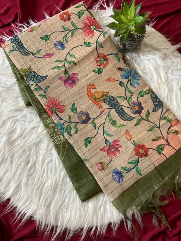 Soft_Tussar_Silk_sarees_with_Beautiful_Style_Of_Kalamkari_Digital_Print_With_Attractive_Border_And_Contrast_Print_Blouse_With_Tassels