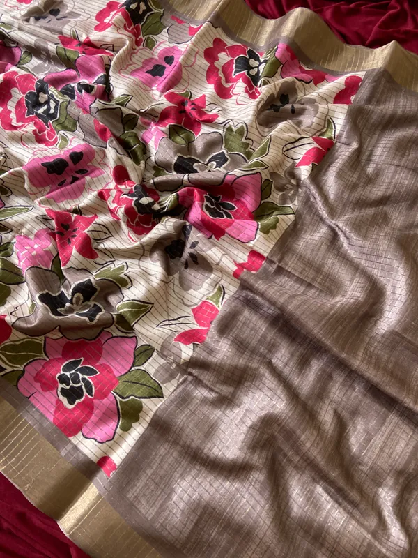 Soft_Tussar_Silk_sarees_with_Beautiful_Style_Of_Floral_Digital_Print_With_Attractive_Border_And_Contrast_Print_Blouse_With_Tassels