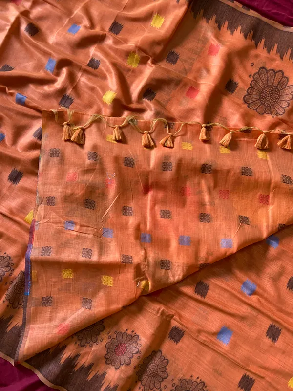 Premium_Soft_Muga_Cotton_sarees_with_Beautiful_Colourfull_3D_Woven_Flower_Design_Pallu_With_Attractive_All_Over_Resham_Weaving_Butti_Design_With_Resham_Weaving_Border_And_Resham_Weaving_Butti_Blouse_With_Fancy_Tassels