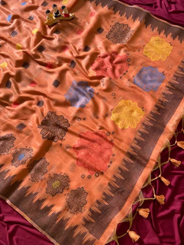 Premium_Soft_Muga_Cotton_sarees_with_Beautiful_Colourfull_3D_Woven_Flower_Design_Pallu_With_Attractive_All_Over_Resham_Weaving_Butti_Design_With_Resham_Weaving_Border_And_Resham_Weaving_Butti_Blouse_With_Fancy_Tassels
