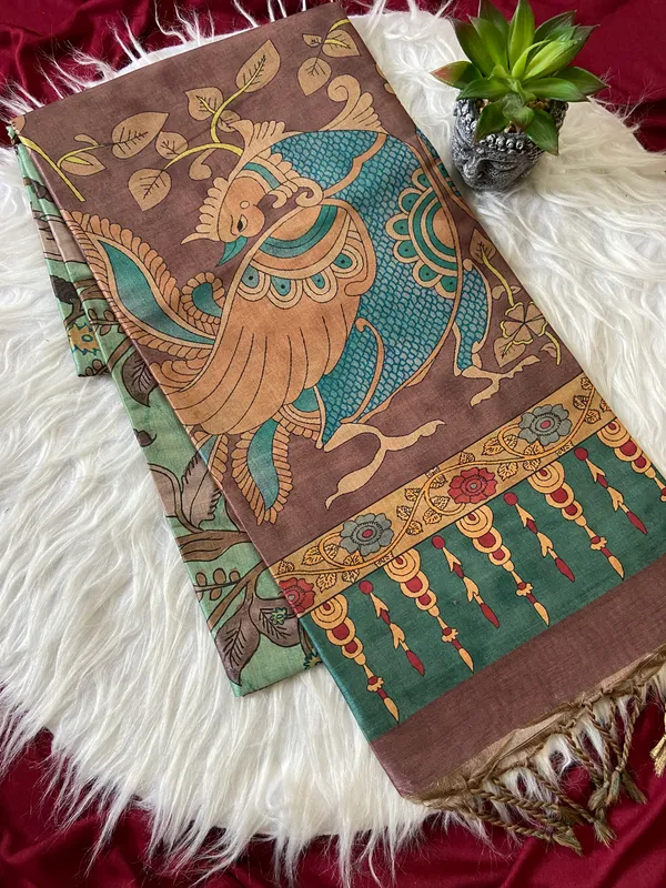 Soft_Tussar_Silk_sarees_with_Beautiful_Style_Of_Kalamkari_Digital_Print_With_Attractive_Border_And_Contrast_Print_Blouse_With_Tassels