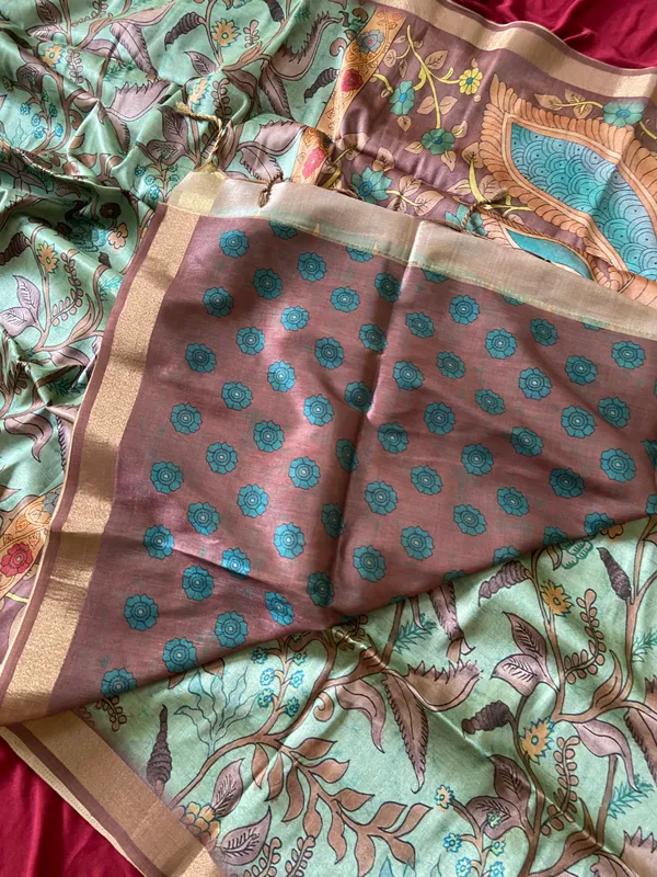 Soft_Tussar_Silk_sarees_with_Beautiful_Style_Of_Kalamkari_Digital_Print_With_Attractive_Border_And_Contrast_Print_Blouse_With_Tassels
