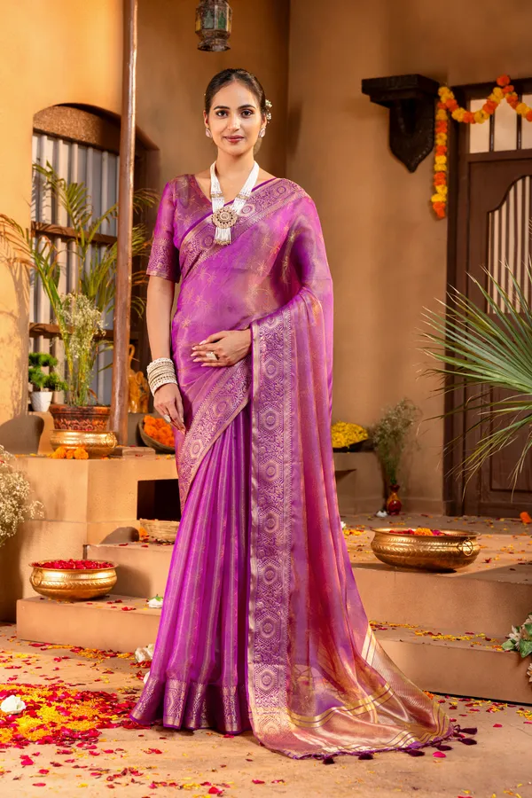 Premium_Soft_Fandy_Satin_sarees_with_Beautiful_Self_Design_Weaving__Pallu_With_Attractive_Traditional_Zari_Weaving__Border_With_All_Over_Self_Weaving__Design_And_Self_Design_Weaving__Blouse_With_Fancy_Tassels