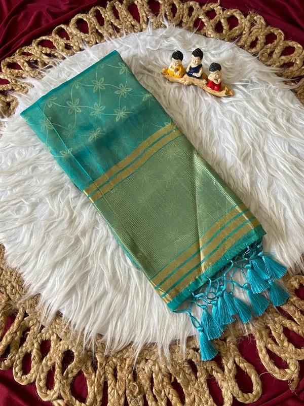Premium_Soft_Fandy_Satin_sarees_with_Beautiful_Self_Design_Weaving__Pallu_With_Attractive_Traditional_Zari_Weaving__Border_With_All_Over_Self_Weaving__Design_And_Self_Design_Weaving__Blouse_With_Fancy_Tassels