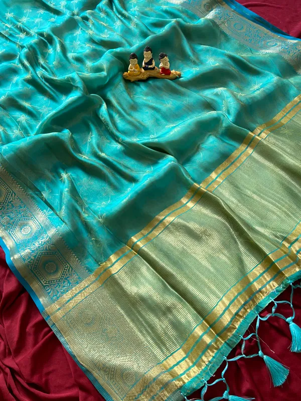 Premium_Soft_Fandy_Satin_sarees_with_Beautiful_Self_Design_Weaving__Pallu_With_Attractive_Traditional_Zari_Weaving__Border_With_All_Over_Self_Weaving__Design_And_Self_Design_Weaving__Blouse_With_Fancy_Tassels
