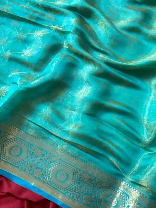 Premium_Soft_Fandy_Satin_sarees_with_Beautiful_Self_Design_Weaving__Pallu_With_Attractive_Traditional_Zari_Weaving__Border_With_All_Over_Self_Weaving__Design_And_Self_Design_Weaving__Blouse_With_Fancy_Tassels