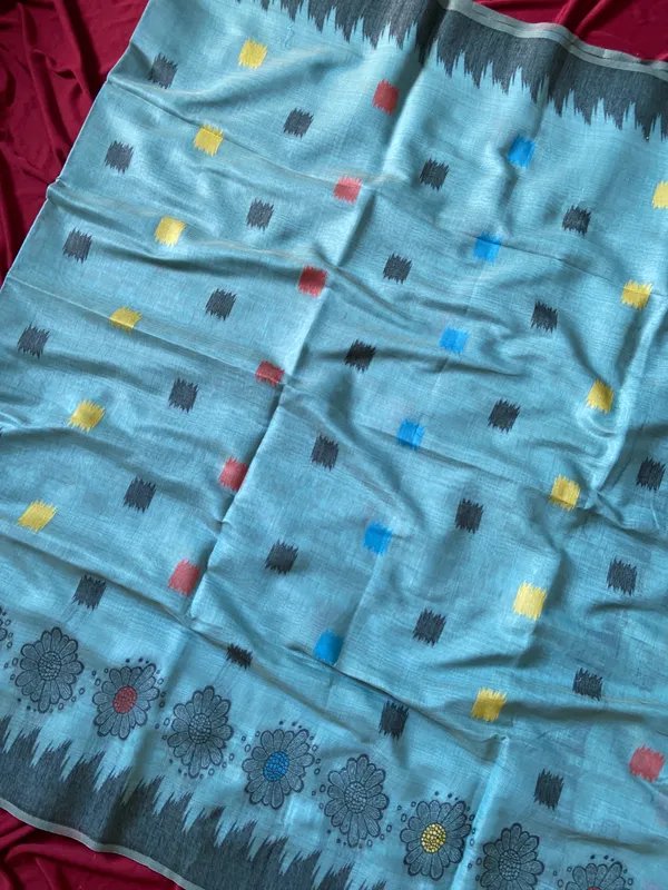 Premium_Soft_Muga_Cotton_sarees_with_Beautiful_Colourfull_3D_Woven_Flower_Design_Pallu_With_Attractive_All_Over_Resham_Weaving_Butti_Design_With_Resham_Weaving_Border_And_Resham_Weaving_Butti_Blouse_With_Fancy_Tassels
