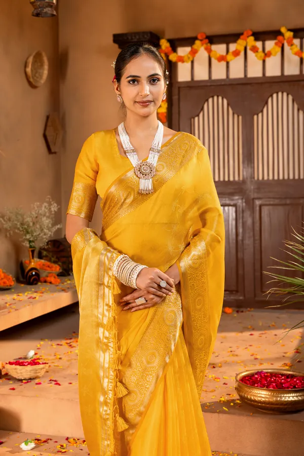 Premium_Soft_Fandy_Satin_sarees_with_Beautiful_Self_Design_Weaving__Pallu_With_Attractive_Traditional_Zari_Weaving__Border_With_All_Over_Self_Weaving__Design_And_Self_Design_Weaving__Blouse_With_Fancy_Tassels