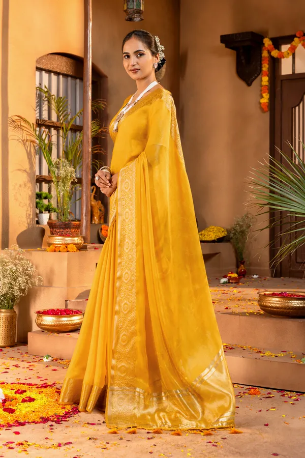 Premium_Soft_Fandy_Satin_sarees_with_Beautiful_Self_Design_Weaving__Pallu_With_Attractive_Traditional_Zari_Weaving__Border_With_All_Over_Self_Weaving__Design_And_Self_Design_Weaving__Blouse_With_Fancy_Tassels