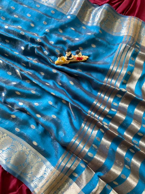Premium_Soft_Khadi_Shimmer_sarees_with_Beautiful_Butti_Design_Weaving__Pallu_With_Attractive_Traditional_Zari_Weaving__Border_With_All_Over_Butti_Weaving__Design_And_Butti_Design_Weaving__Blouse_With_Fancy_Tassels