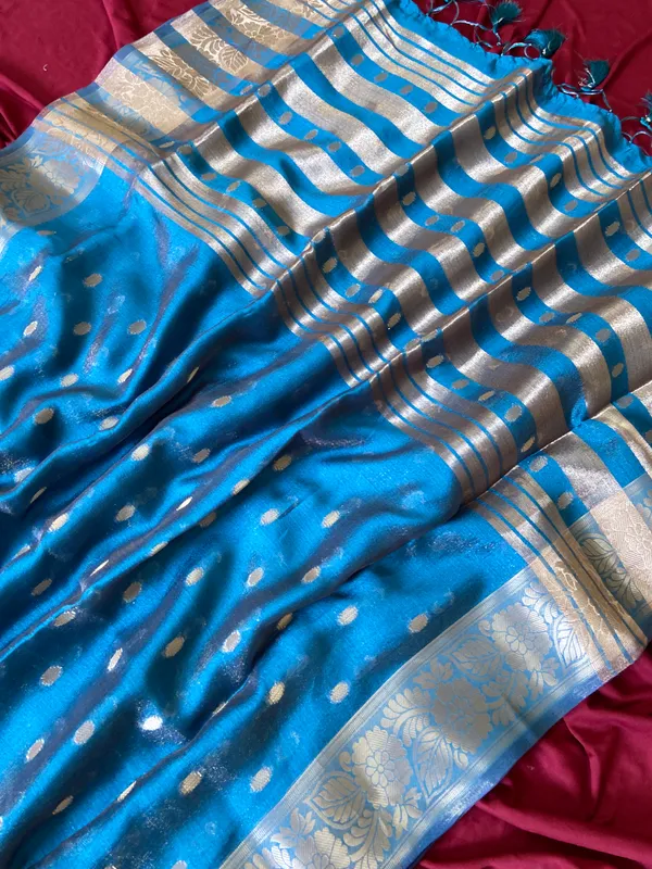 Premium_Soft_Khadi_Shimmer_sarees_with_Beautiful_Butti_Design_Weaving__Pallu_With_Attractive_Traditional_Zari_Weaving__Border_With_All_Over_Butti_Weaving__Design_And_Butti_Design_Weaving__Blouse_With_Fancy_Tassels