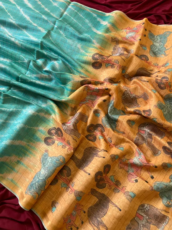 Soft_Tussar_Silk_sarees_with_Beautiful_Srikalahasti_Style_Of_Kalamkari_Digital_Print_With_Attractive_Border_And_Contrast_Print_Blouse_With_Tassels