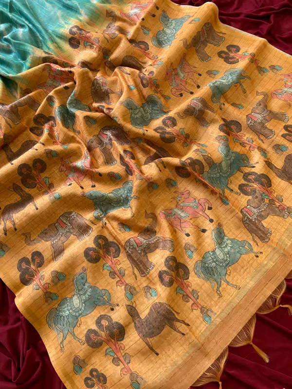 Soft_Tussar_Silk_sarees_with_Beautiful_Srikalahasti_Style_Of_Kalamkari_Digital_Print_With_Attractive_Border_And_Contrast_Print_Blouse_With_Tassels