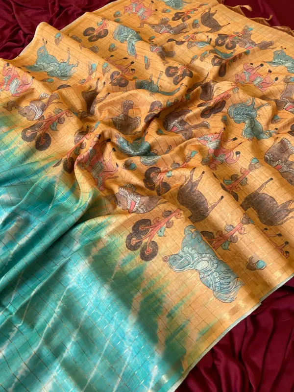 Soft_Tussar_Silk_sarees_with_Beautiful_Srikalahasti_Style_Of_Kalamkari_Digital_Print_With_Attractive_Border_And_Contrast_Print_Blouse_With_Tassels