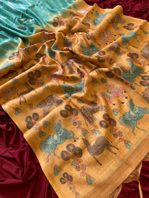 Soft_Tussar_Silk_sarees_with_Beautiful_Srikalahasti_Style_Of_Kalamkari_Digital_Print_With_Attractive_Border_And_Contrast_Print_Blouse_With_Tassels
