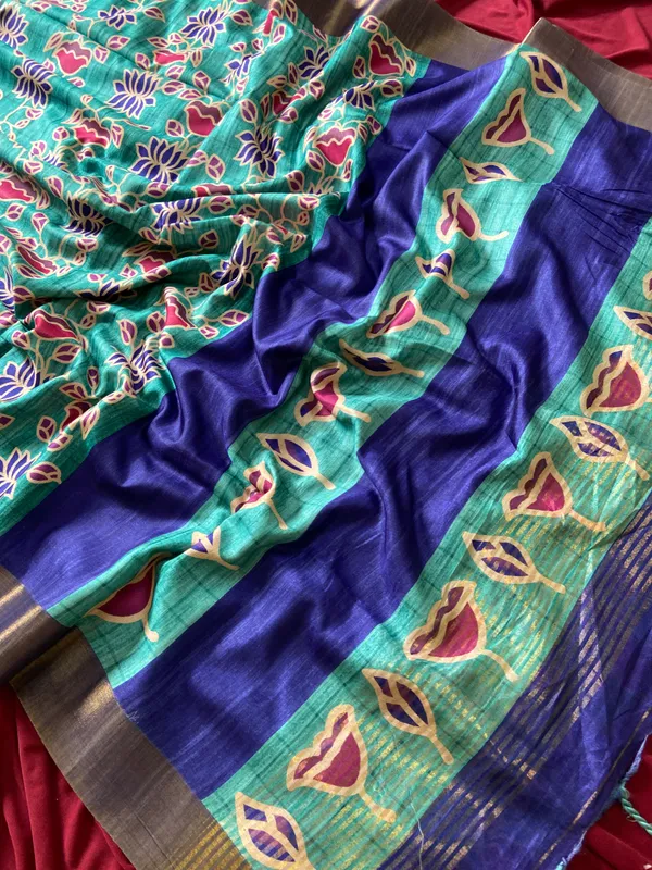 Soft_Tussar_Silk_sarees_with_Beautiful_Style_Of_Kalamkari_Digital_Print_With_Attractive_Border_And_Contrast_Print_Blouse_With_Tassels