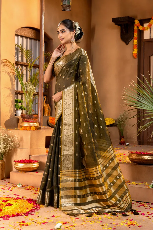 Premium_Soft_Khadi_Shimmer_sarees_with_Beautiful_Butti_Design_Weaving__Pallu_With_Attractive_Traditional_Zari_Weaving__Border_With_All_Over_Butti_Weaving__Design_And_Butti_Design_Weaving__Blouse_With_Fancy_Tassels