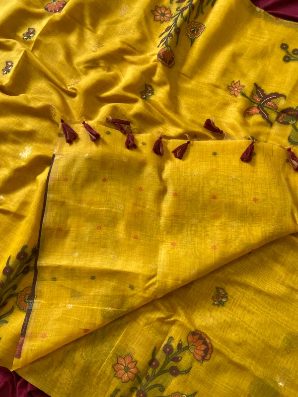 Premium_Soft_Muga_Cotton_sarees_with_Beautiful_Colourfull_Resham_Weaving__Flower_Design_Pallu_With_Attractive_Traditional_Zari_Weaving__With_All_Over__Resham_Weaving__And_Resham_Weaving_Butti_Blouse_With_Fancy_Tassels