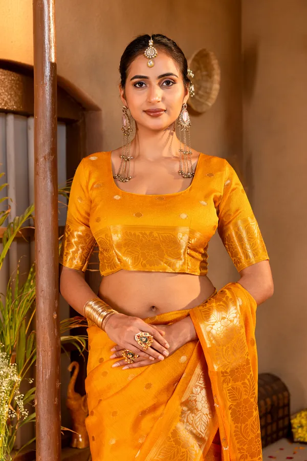 Premium_Soft_Khadi_Shimmer_sarees_with_Beautiful_Butti_Design_Weaving__Pallu_With_Attractive_Traditional_Zari_Weaving__Border_With_All_Over_Butti_Weaving__Design_And_Butti_Design_Weaving__Blouse_With_Fancy_Tassels